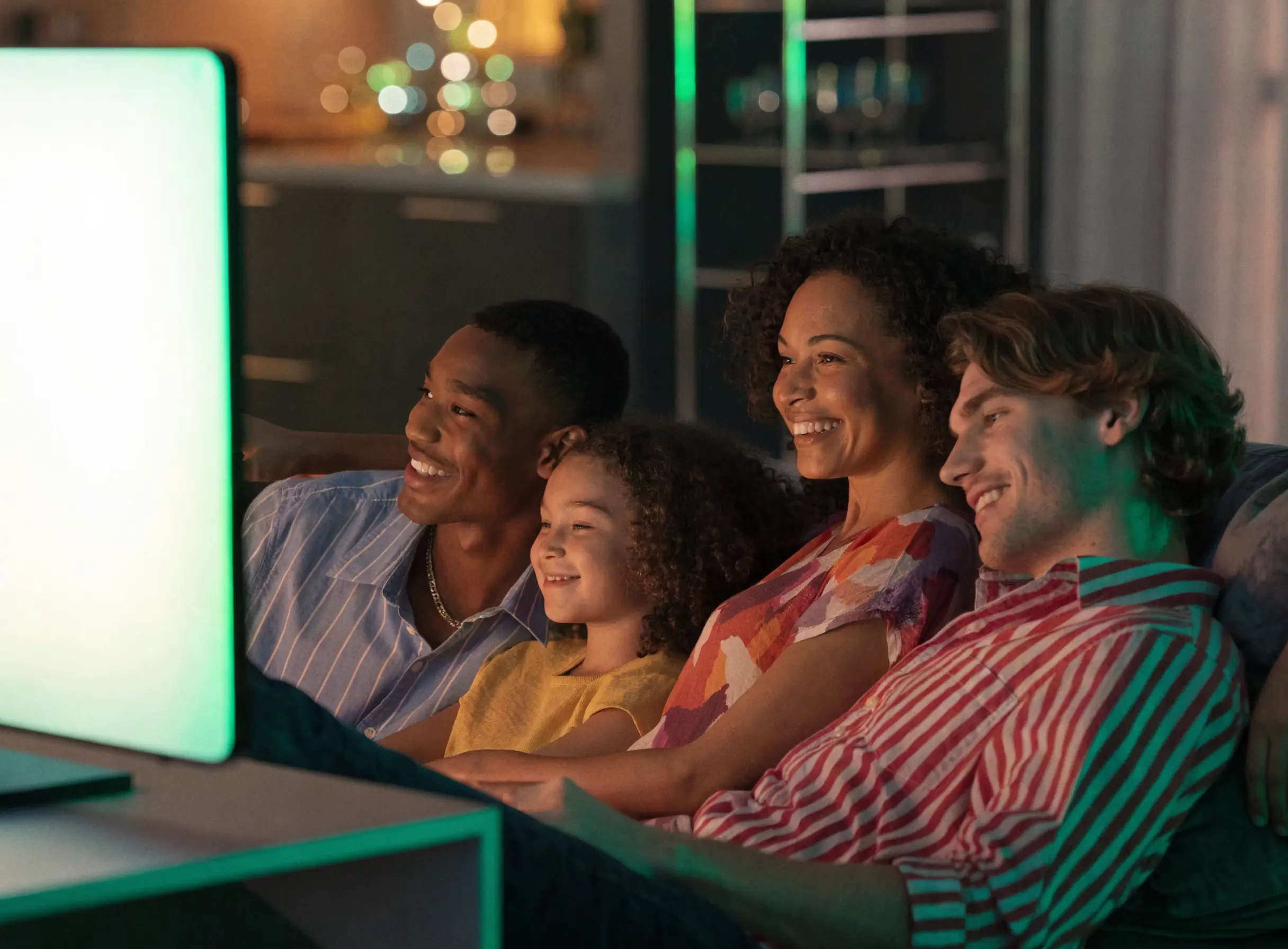 A family in Ireland watching live TV together on a smart TV